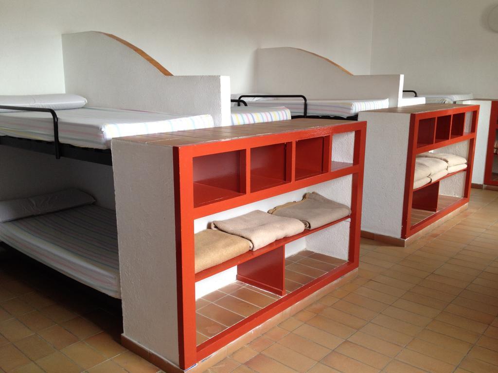 Cama en habitación compartida mixta de 21 camas